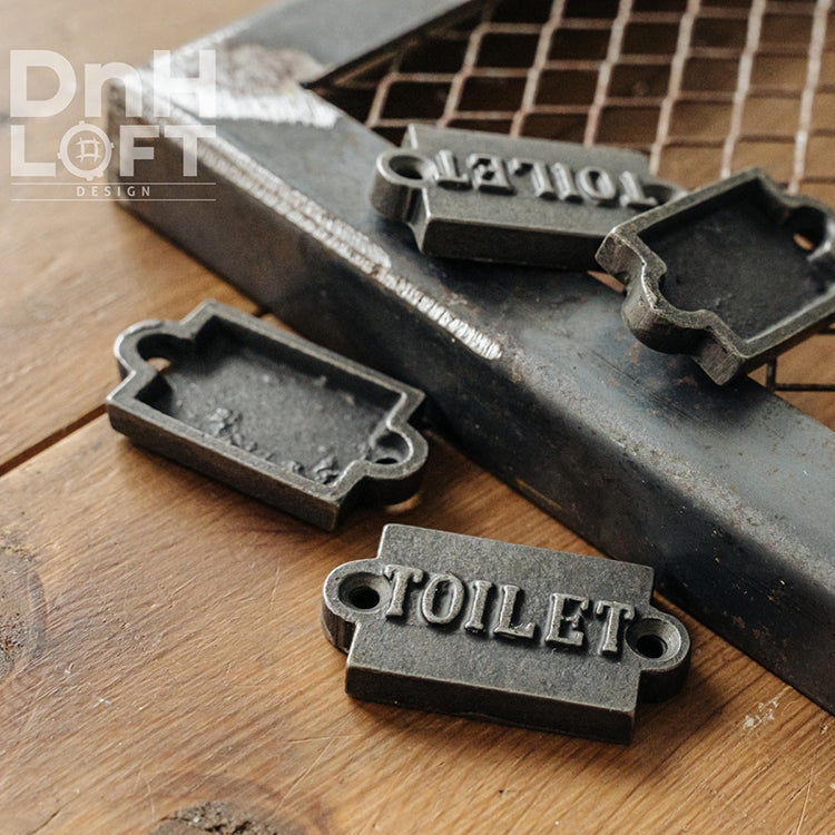 British cast iron toilet sign