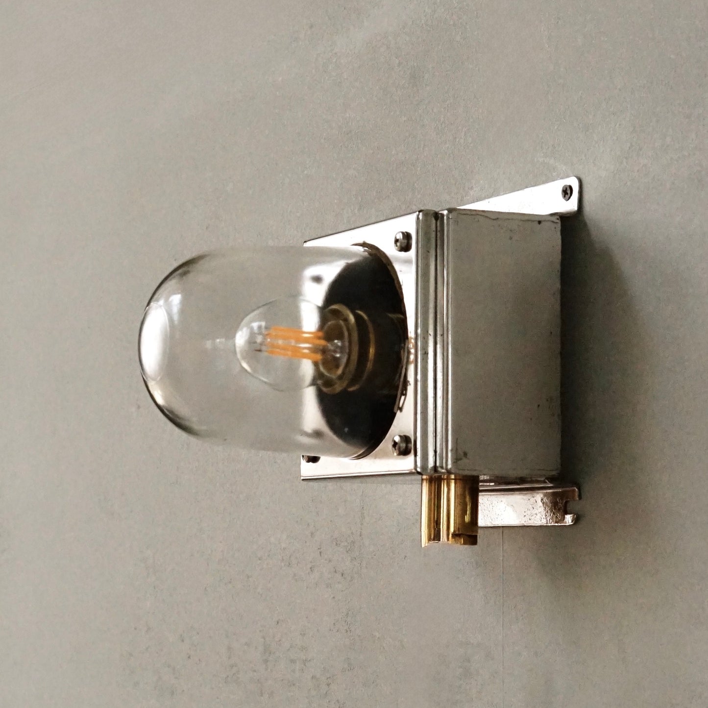 Cast iron upright wall light