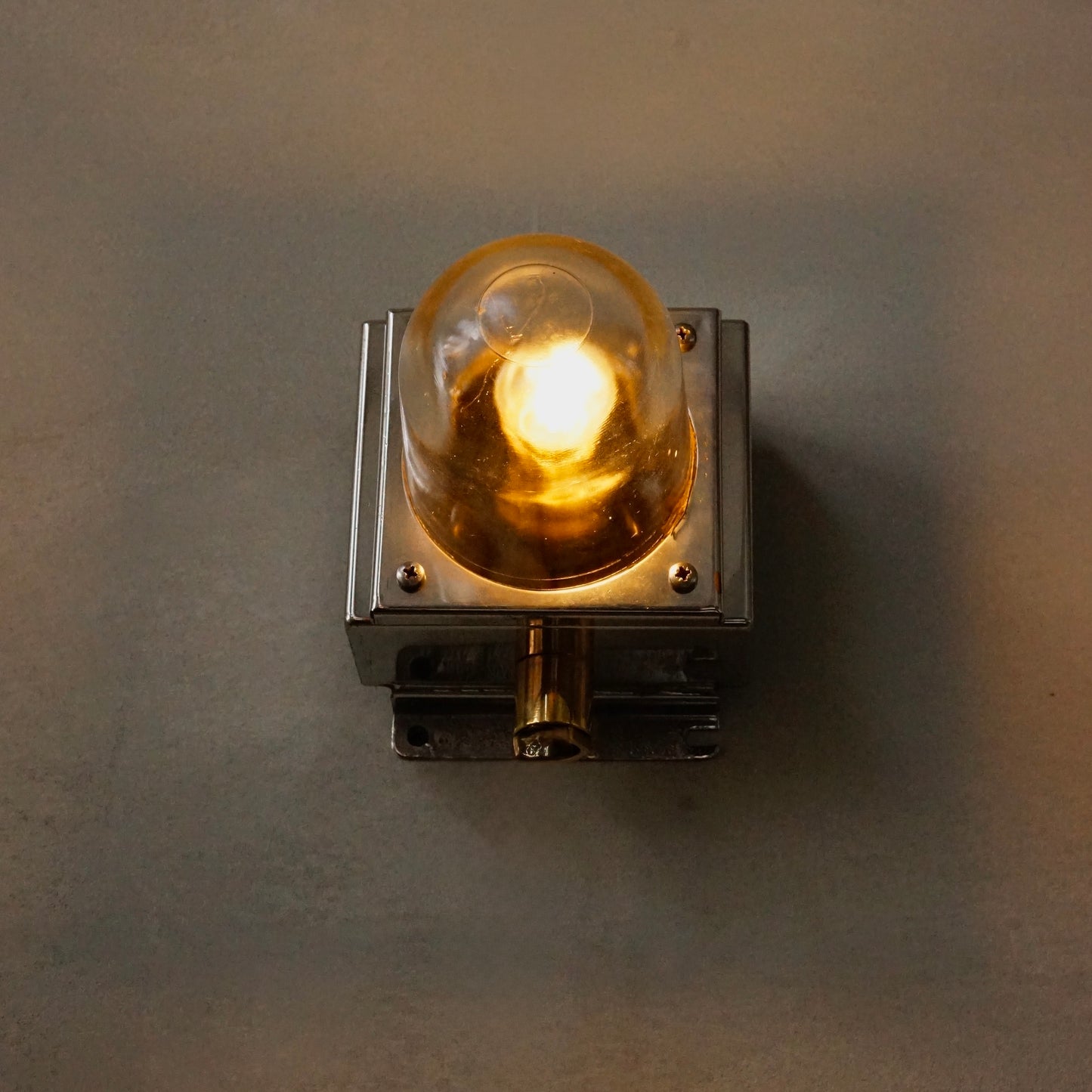 Cast iron upright wall light