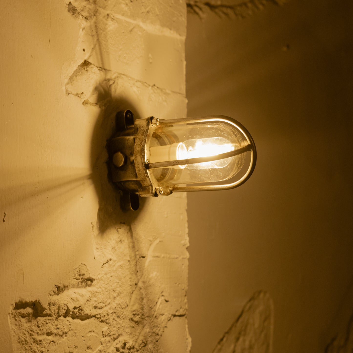 Cast iron upright wall light