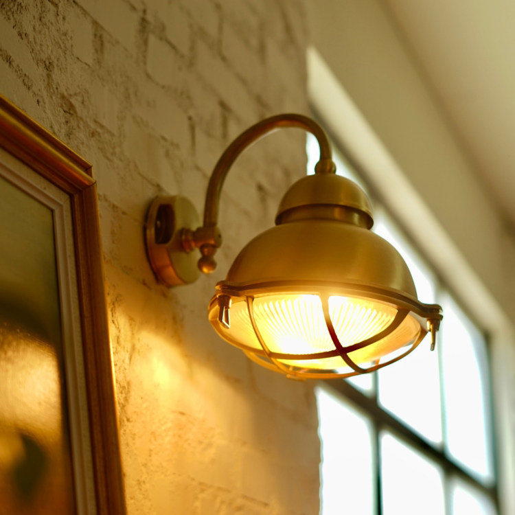brass mesh wall light