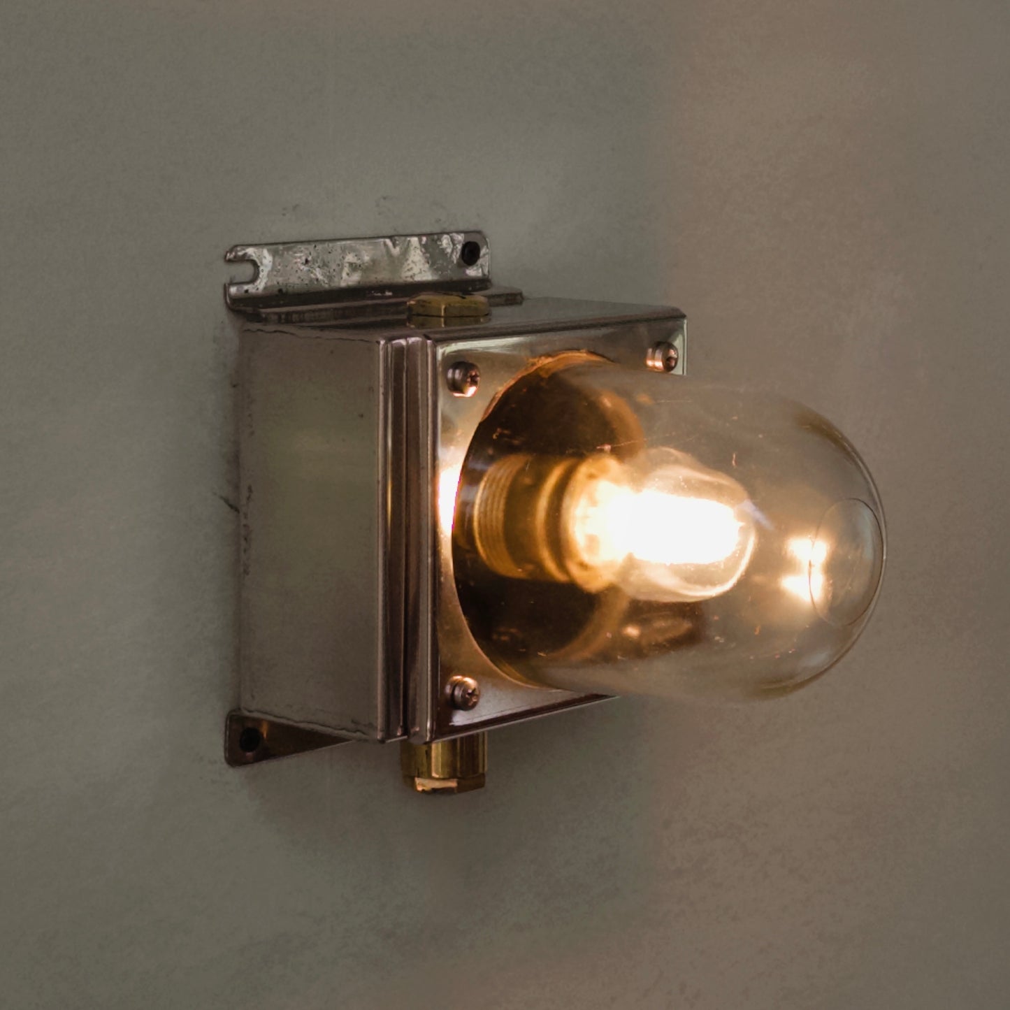 Cast iron upright wall light